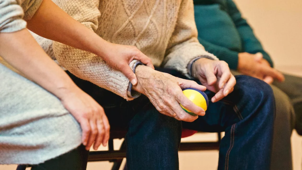 Man holding a stress ball